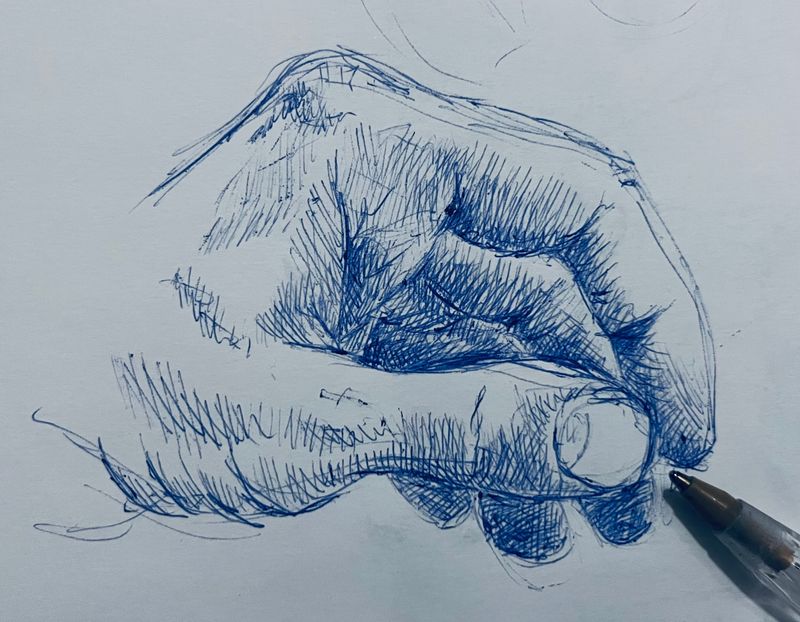 Blue biro sketch of my left hand
